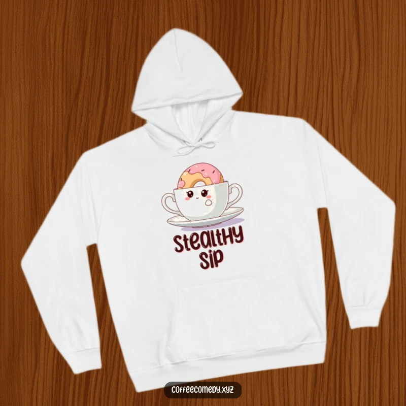 Funny Kawaii Doughnut Hoodie: A cozy hoodie with a curious doughnut character peeking from behind a teacup, perfect for relaxation.