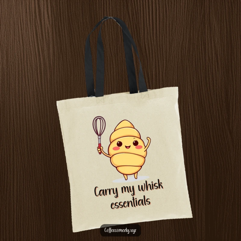 Funny tote bag with a happy croissant character waving a small whisk, perfect for groceries or market trips.